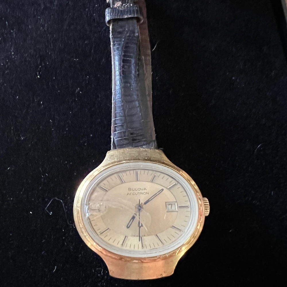 Women’s Bulova watch with brown leather band